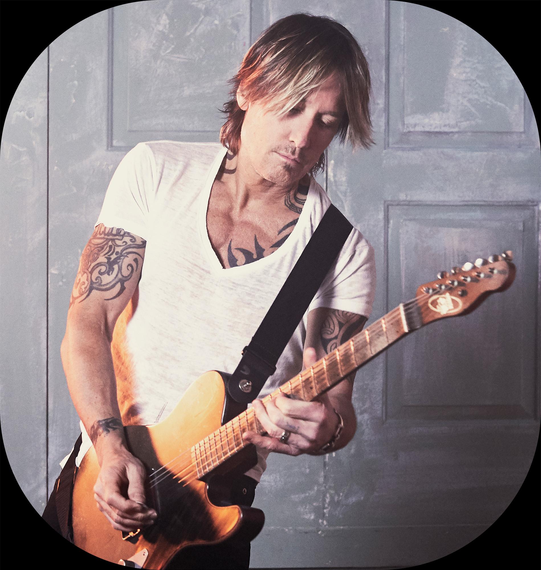 Keith Urban with his guitar