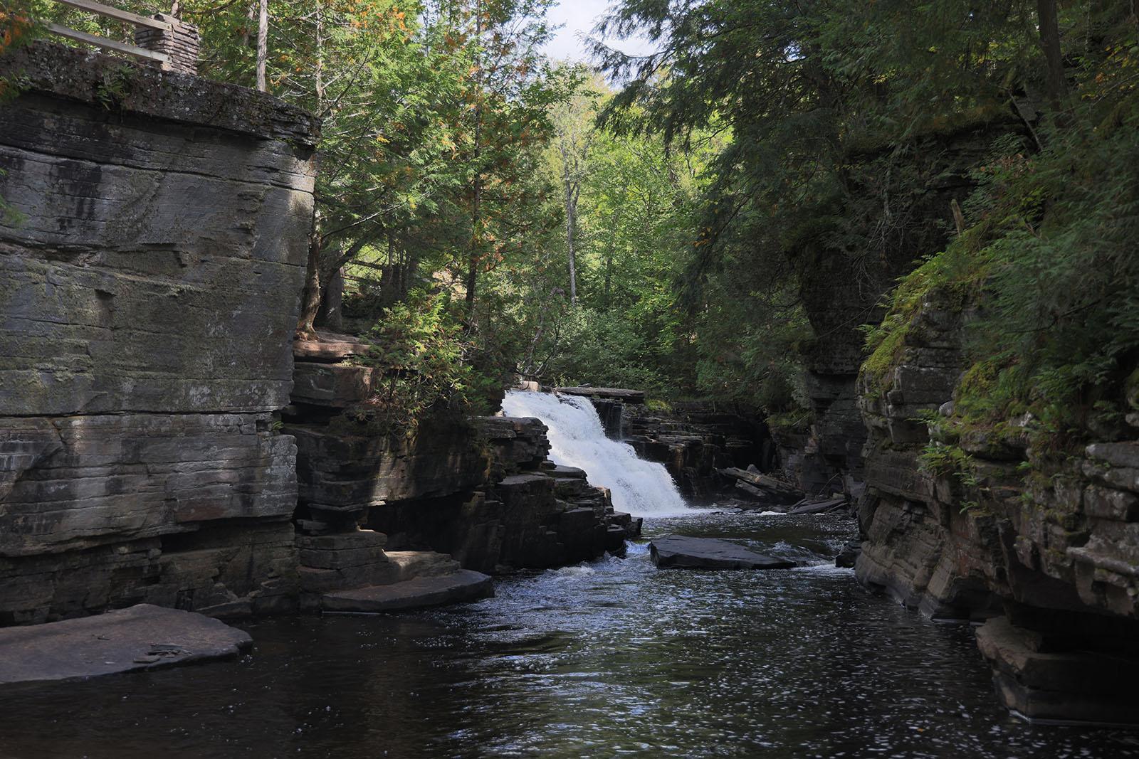 A waterfall flowing within Canyon Falls