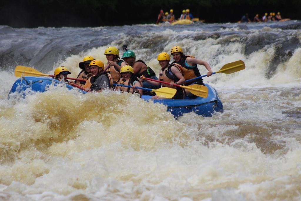 A group white water rafting at Piers Gorge