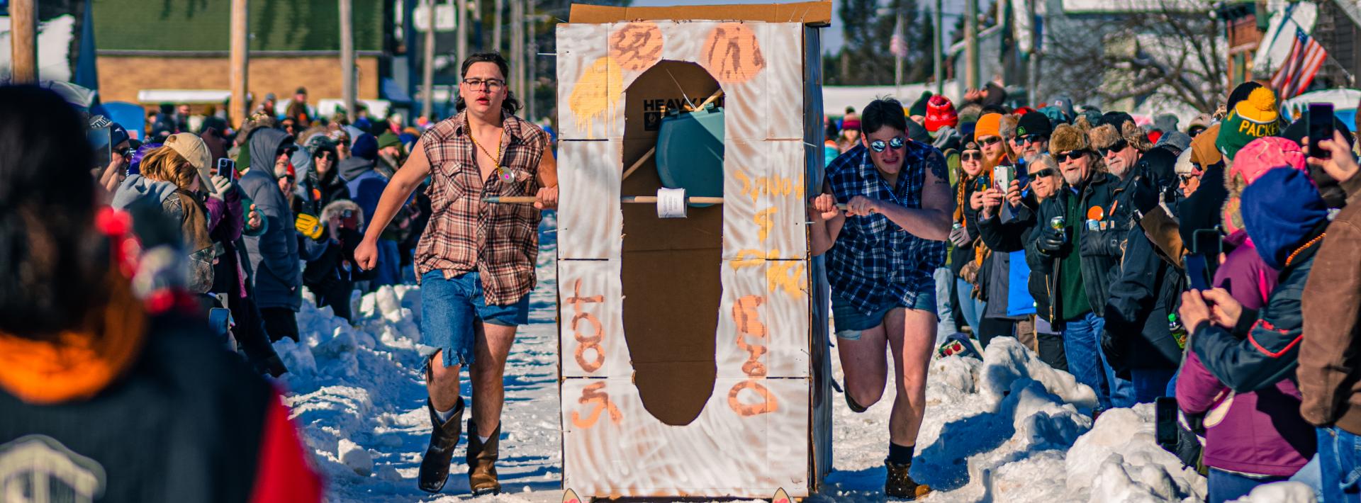 "Thrills on Skis: The Trenary Outhouse Classic in Action"