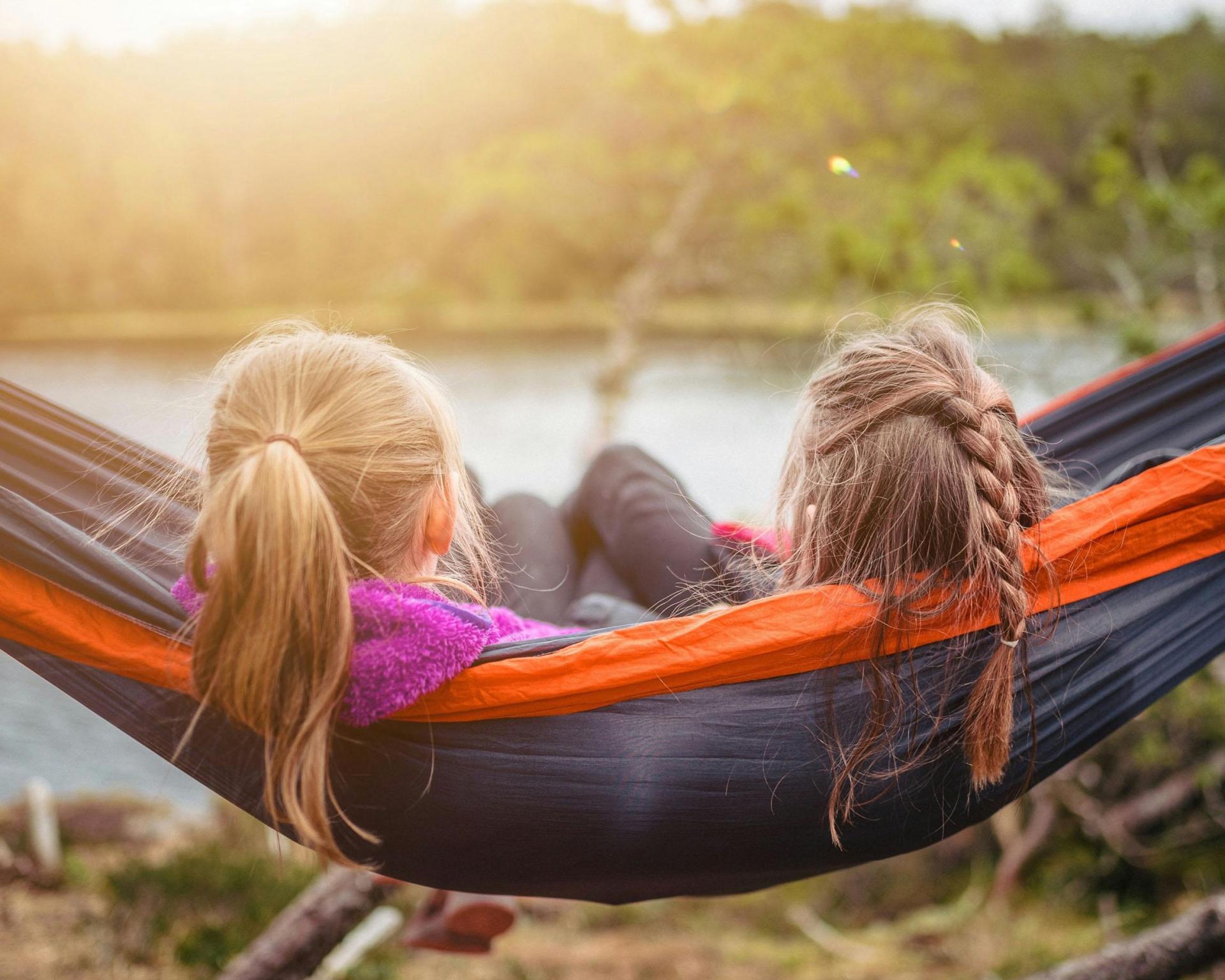 Two kids in a hammock.