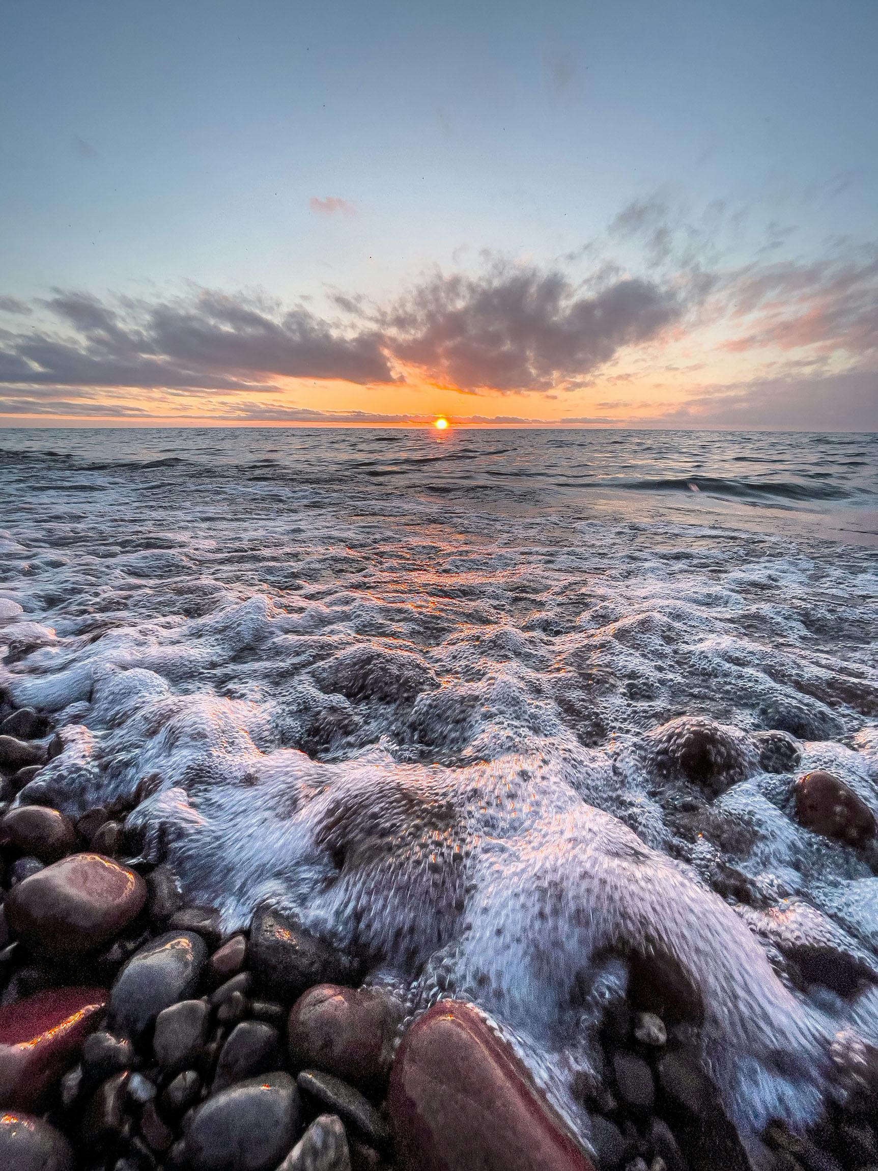 Sunset and beach stones. 