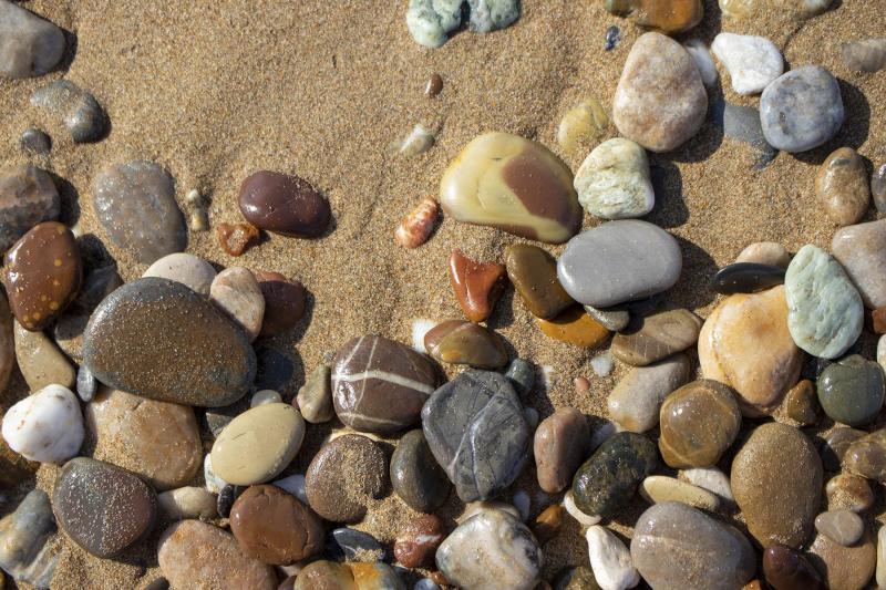 A variety of stones on the beach.