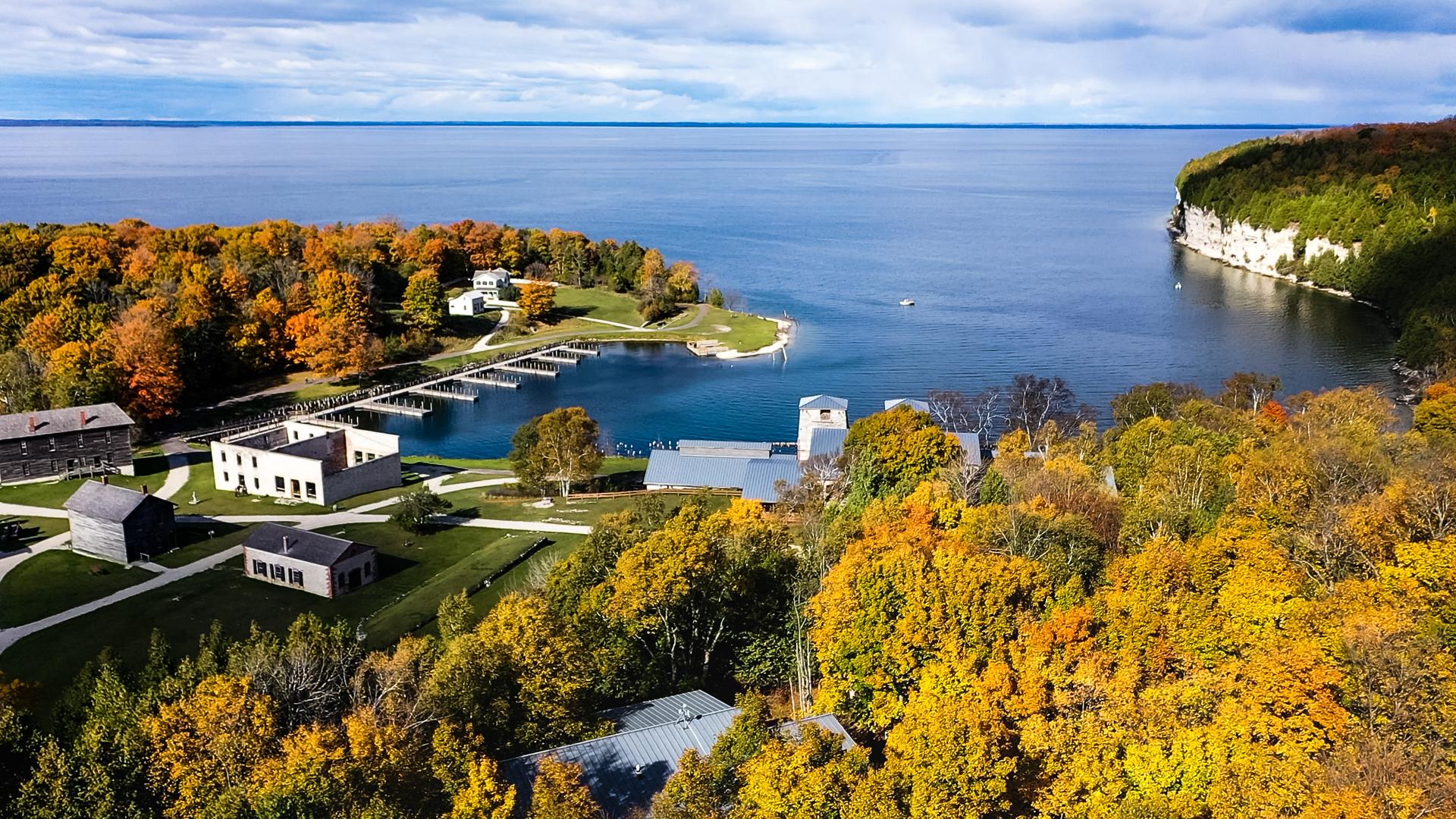 A drone view overlooking Fayette Historic State Park in fall.