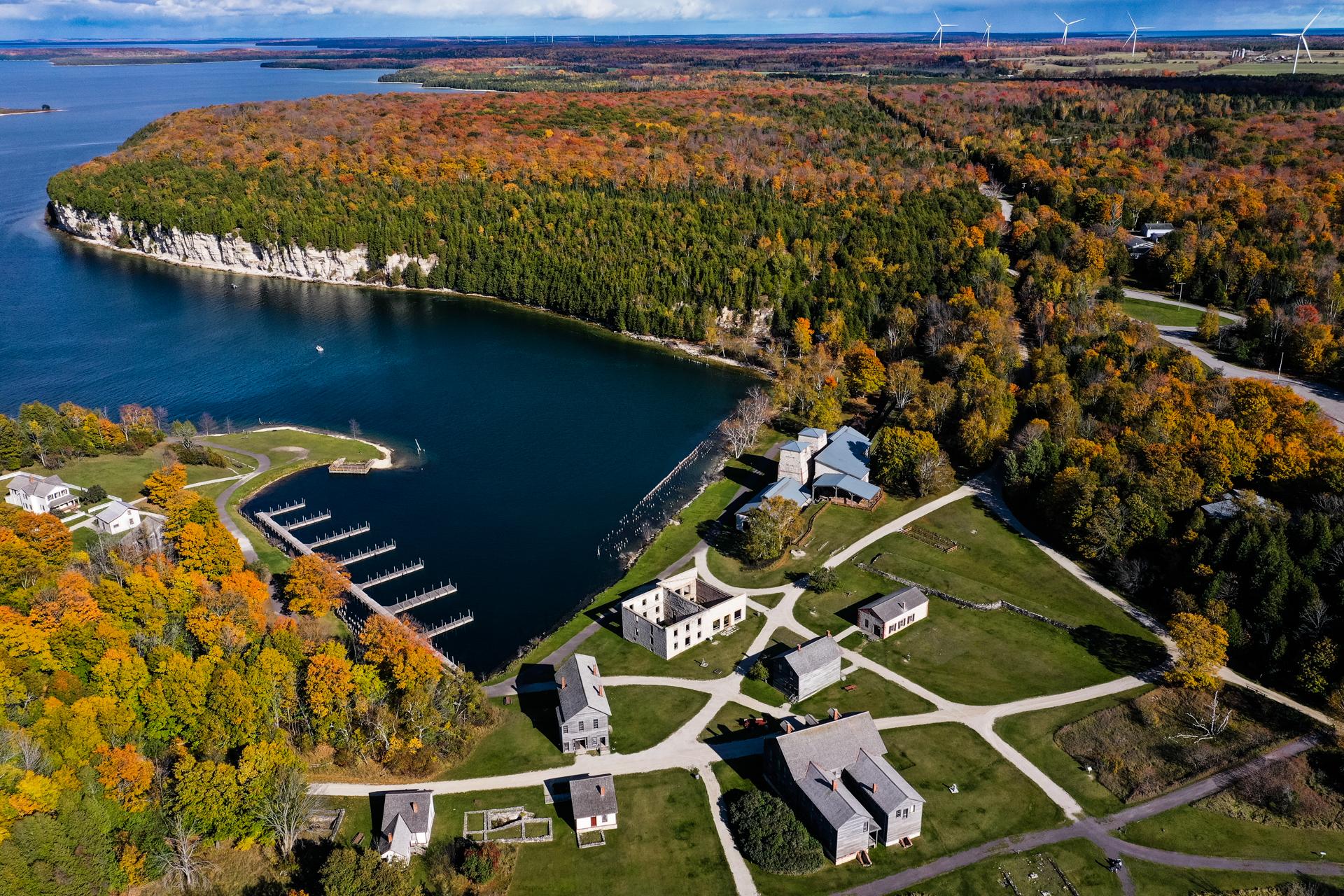 A drone view overlooking Fayette Historic State Park in fall.