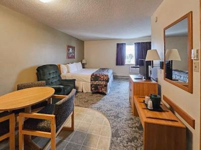 A room at Budget Host Inn & Suites