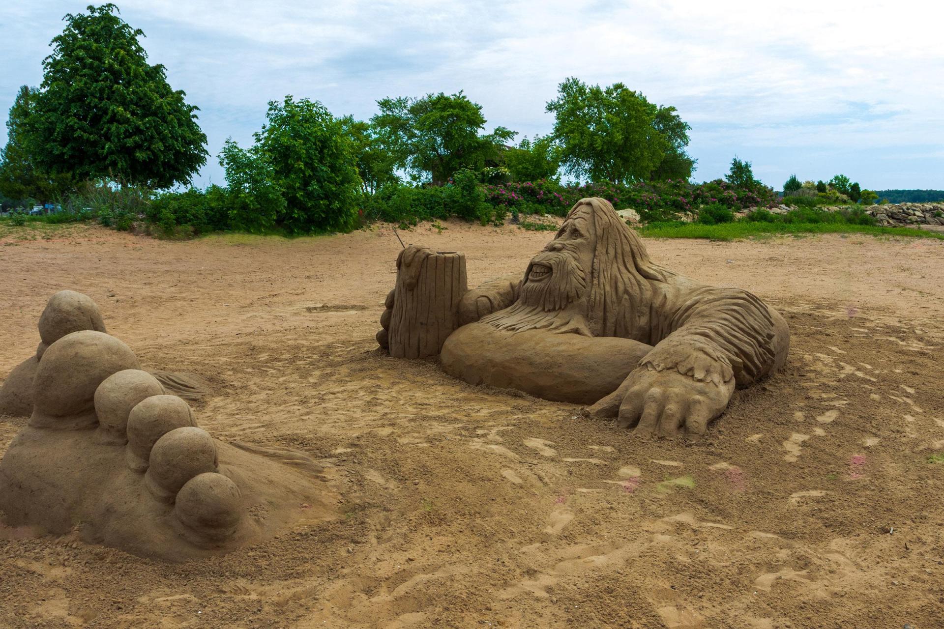 A beach sand sculpture depicting Bigfoot.