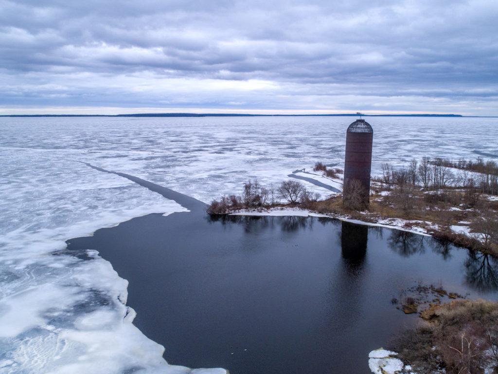 old tower overlooking the icy bay