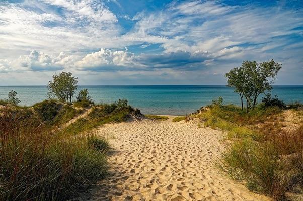 looking over a sand dune to lake michigan