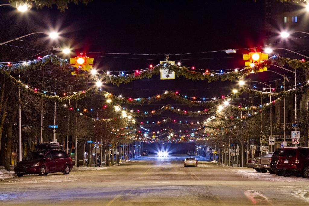 street decorated for Christmas at night