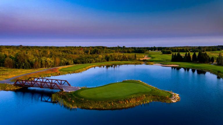 aerial view of a golf course lake