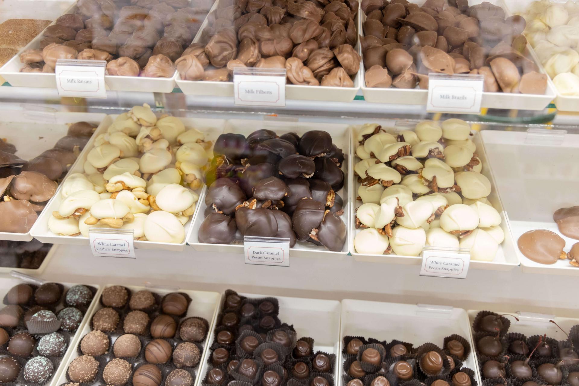 An assortment of chocolate on shelves at Sayklly