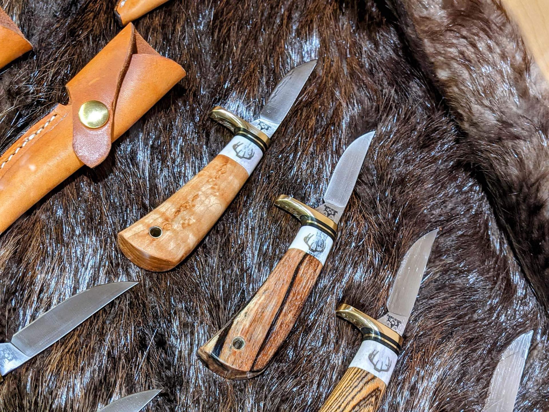 Rapid River Knifeworks custom hunting knives on dispaly