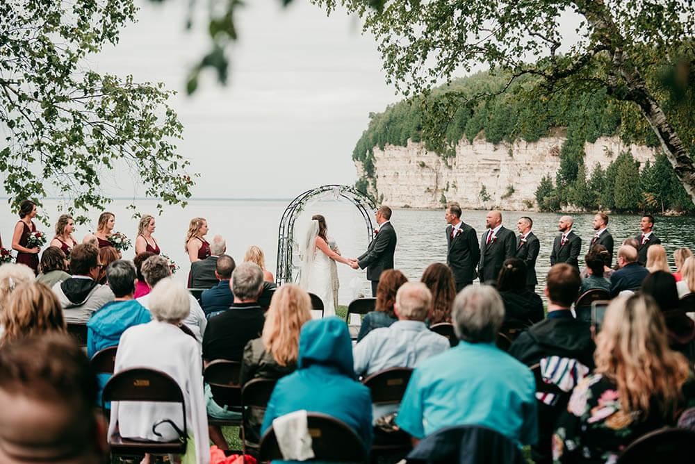 Wedding couple at altar at Fayette in Escnaba