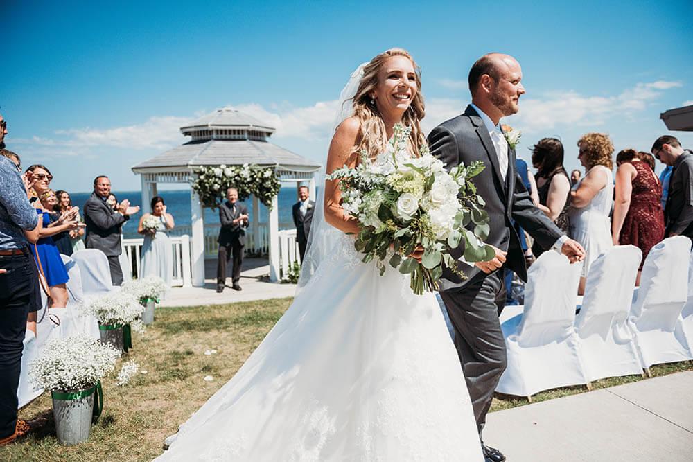 Wedding couple walking down aisle at Terrace Bay