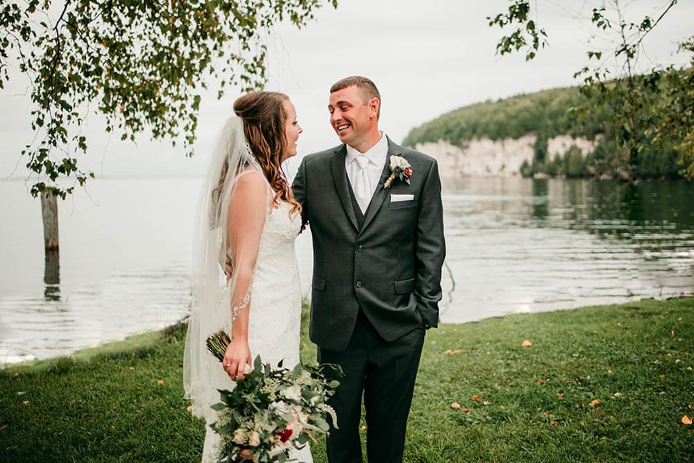 Wedding day couple getting photos taken in Escanaba.