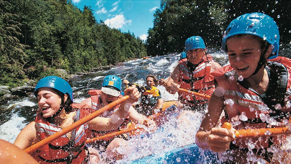 A family whitewater rafting in the Upper Peninsula.